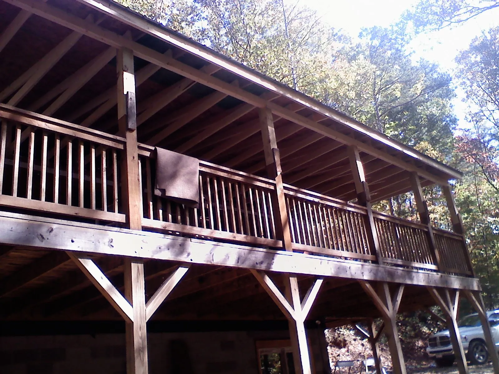 Timber framing under a new elevated porch and deck — Roof Leak Repair in Retsof by Roofing Brothers